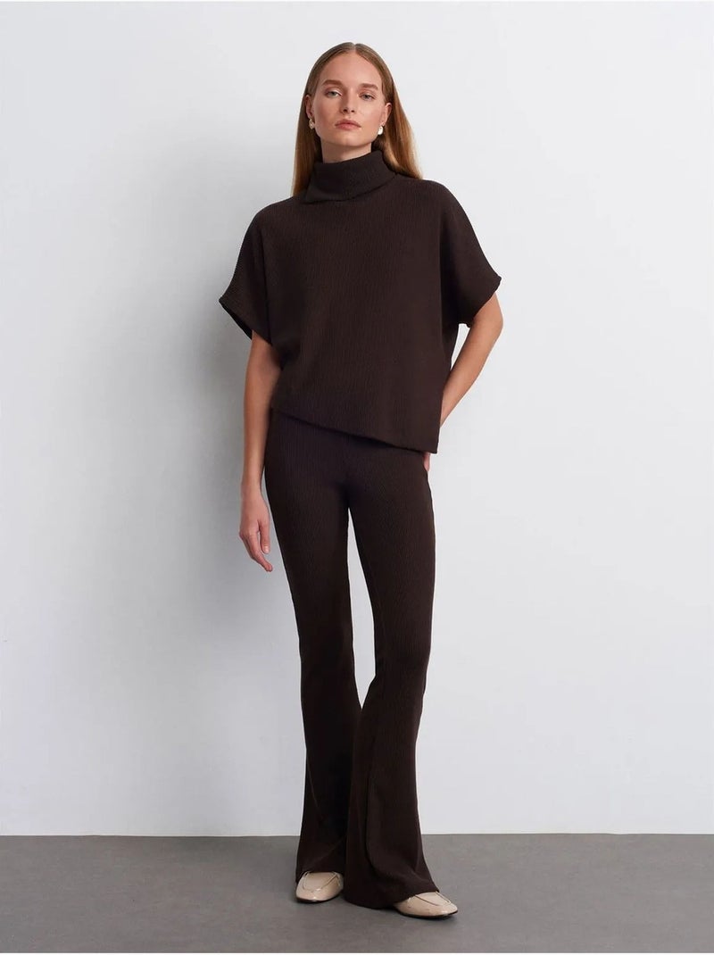 Pantaloni in maglia a zampa a vita alta Marrone cioccolato - Kiabi