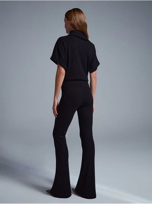 Pantaloni in maglia a zampa a vita alta - Kiabi Pantaloni in maglia a zampa a vita alta - Kiabi