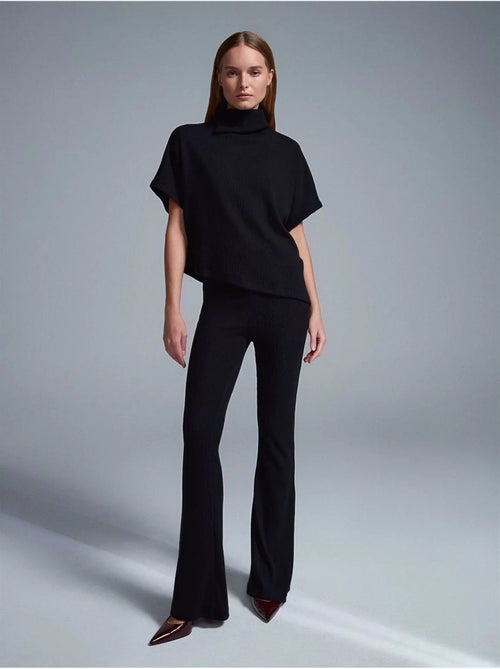 Pantaloni in maglia a zampa a vita alta - Kiabi Pantaloni in maglia a zampa a vita alta - Kiabi