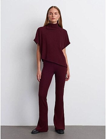 Pantaloni in maglia a zampa a vita alta