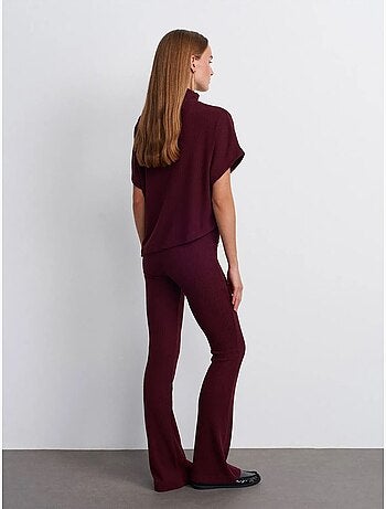Pantaloni in maglia a zampa a vita alta
