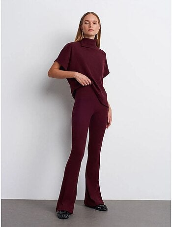 Pantaloni in maglia a zampa a vita alta