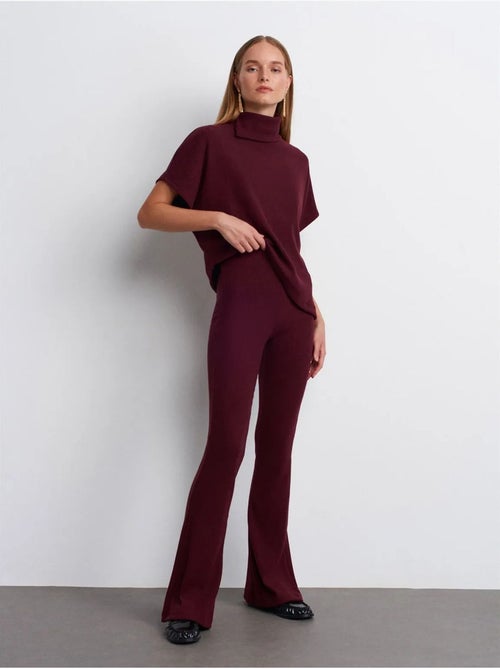 Pantaloni in maglia a zampa a vita alta - Kiabi Pantaloni in maglia a zampa a vita alta - Kiabi