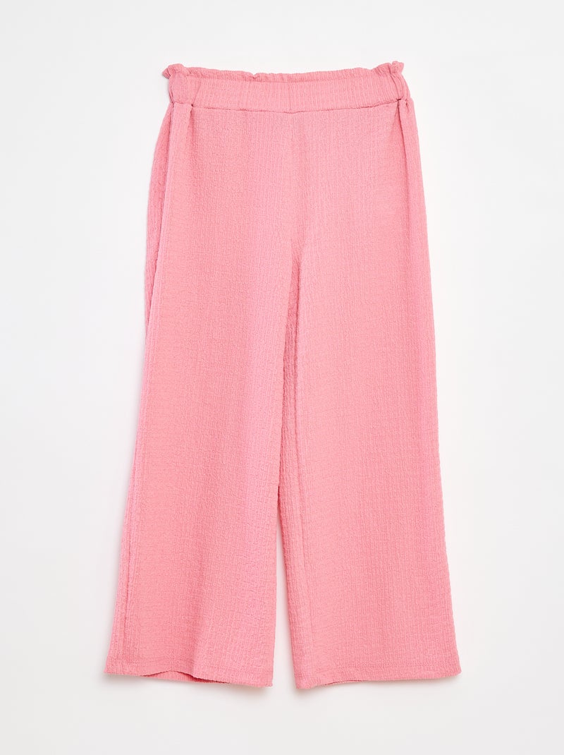 Pantaloni in maglia goffrata con motivi rosa - Kiabi