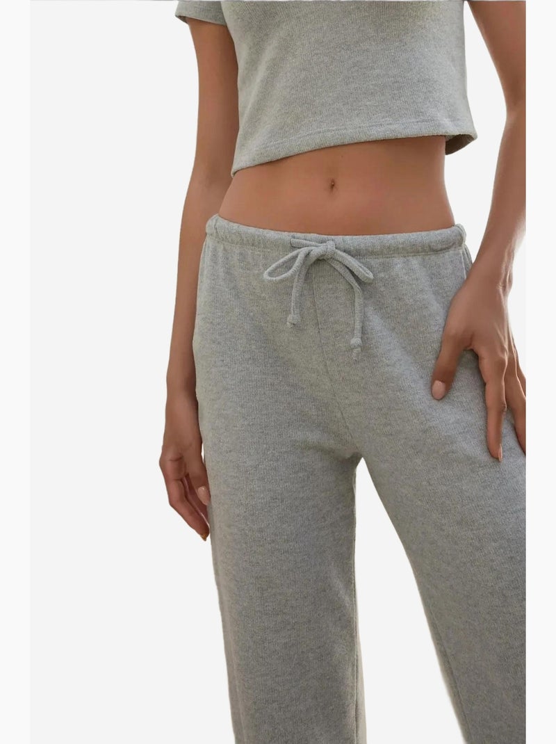 Pantaloni in maglia morbida testurizzata con laccetti hiccup Grigio chiaro - Kiabi