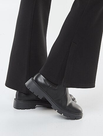 Pantaloni in maglia pesante e morbida taglio bootcut