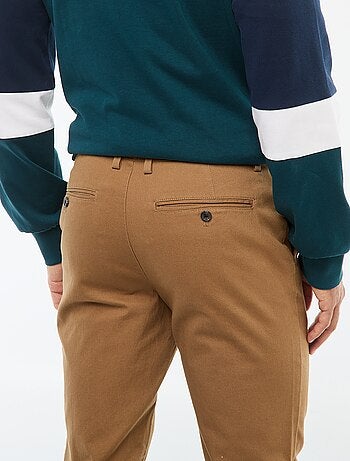 Pantaloni in maglia piqué tinta unita