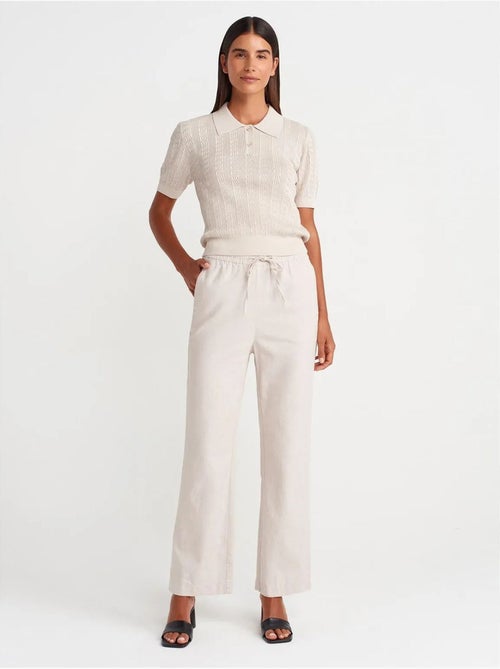 Pantaloni in tencel a gamba ampia con vita con coulisse dilvin - Kiabi Pantaloni in tencel a gamba ampia con vita con coulisse dilvin - Kiabi