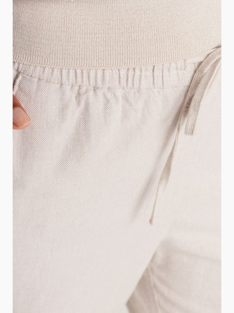 Pantaloni in tencel a gamba ampia con vita con coulisse dilvin Bianco sporco - Kiabi