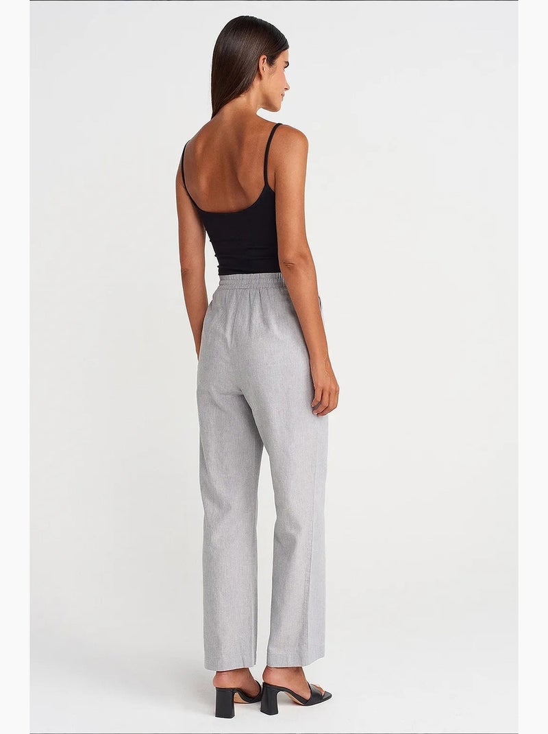 Pantaloni in tencel a gamba ampia con vita con coulisse dilvin Grigio chiaro - Kiabi