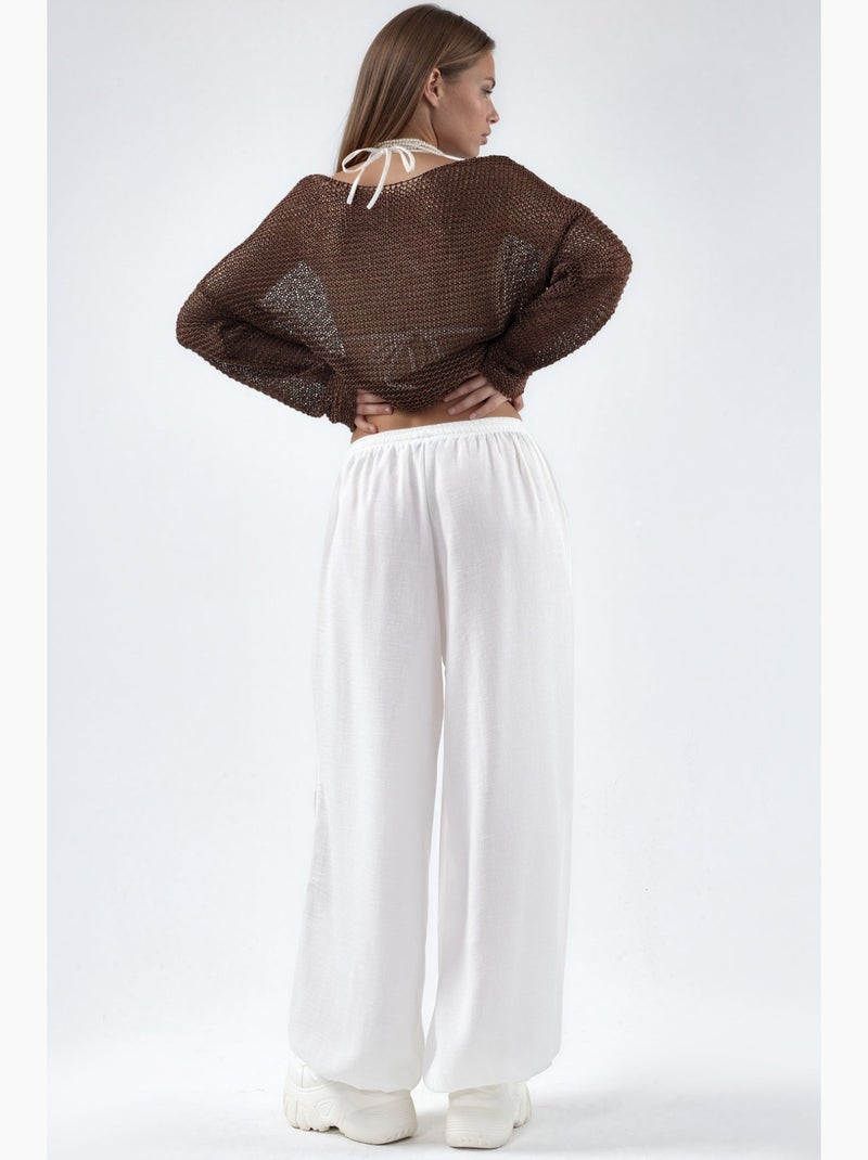 Pantaloni in tessuto a gamba larga con vita a coulisse busem Bianco - Kiabi