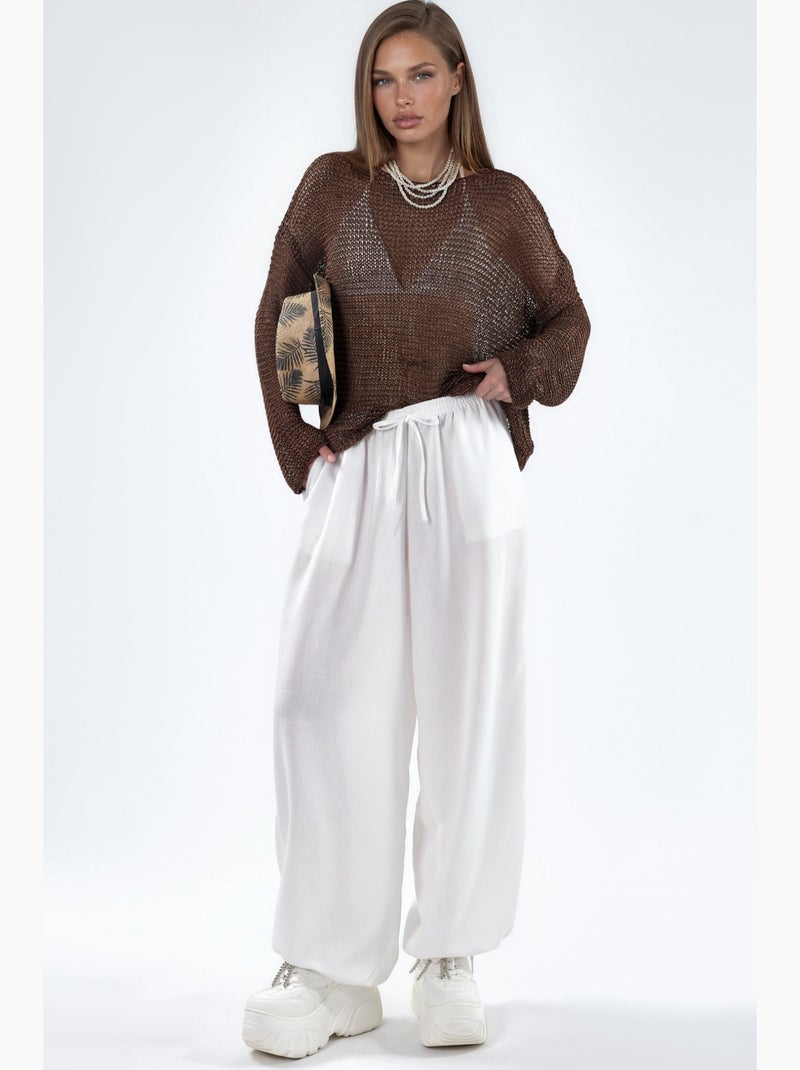 Pantaloni in tessuto a gamba larga con vita a coulisse busem Bianco - Kiabi
