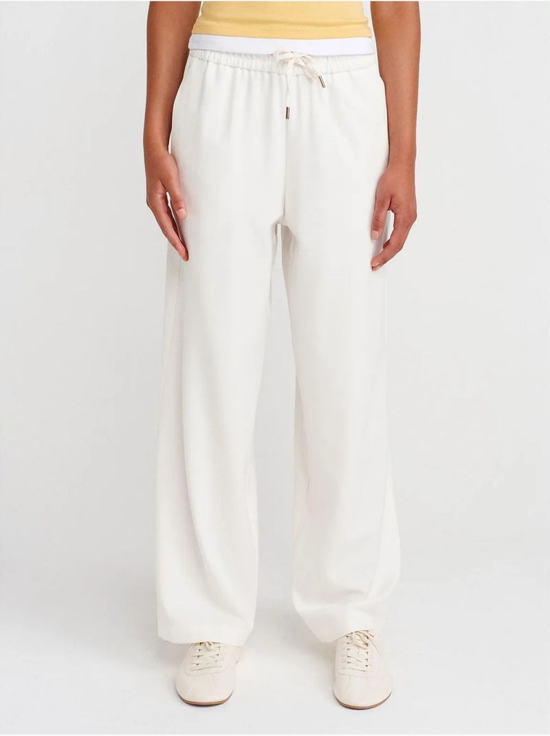 Pantaloni in tessuto a gamba larga con vita con coulisse dilvin Bianco - Kiabi
