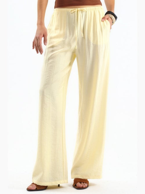 Pantaloni in tessuto a gamba larga da donna busem - Kiabi Pantaloni in tessuto a gamba larga da donna busem - Kiabi