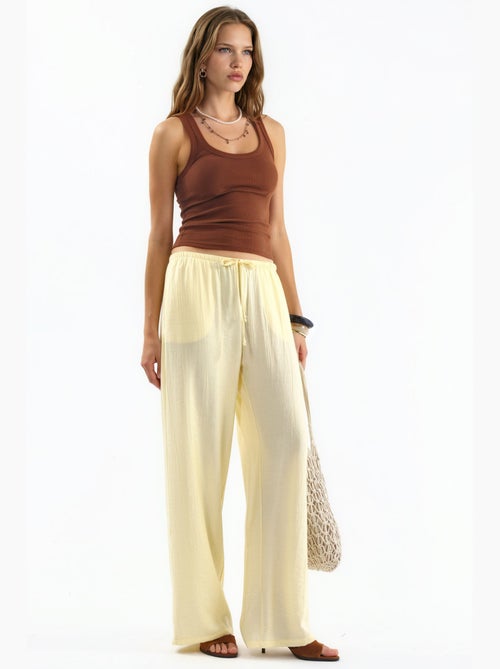 Pantaloni in tessuto a gamba larga da donna busem - Kiabi Pantaloni in tessuto a gamba larga da donna busem - Kiabi