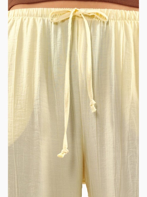 Pantaloni in tessuto a gamba larga da donna busem - Kiabi Pantaloni in tessuto a gamba larga da donna busem - Kiabi