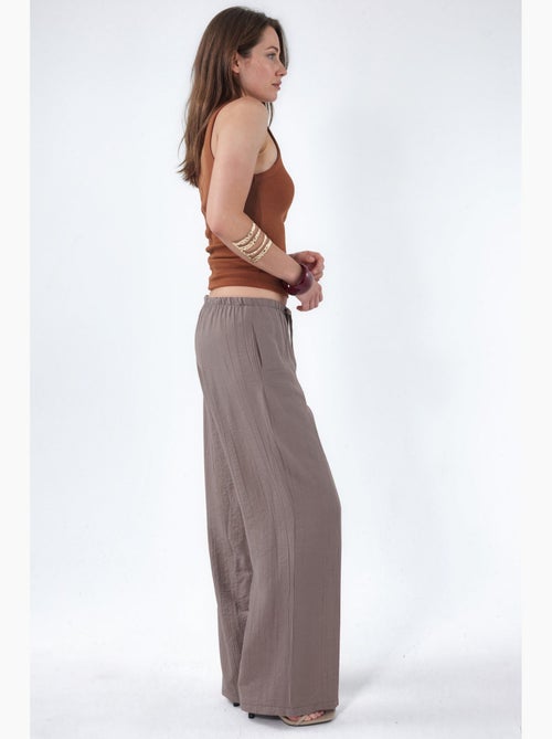 Pantaloni in tessuto a gamba larga da donna busem - Kiabi Pantaloni in tessuto a gamba larga da donna busem - Kiabi
