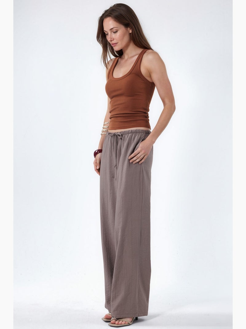 Pantaloni in tessuto a gamba larga da donna busem Tortora - Kiabi