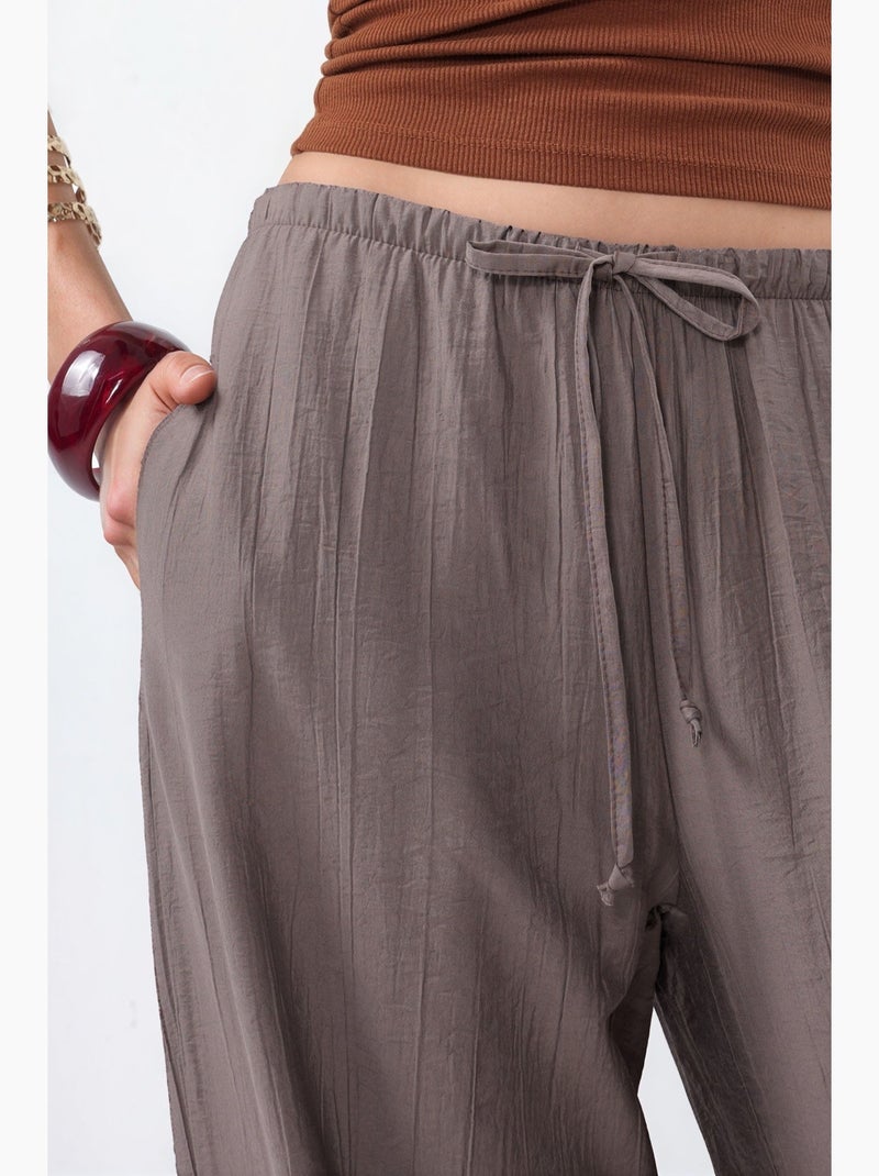 Pantaloni in tessuto a gamba larga da donna busem Tortora - Kiabi