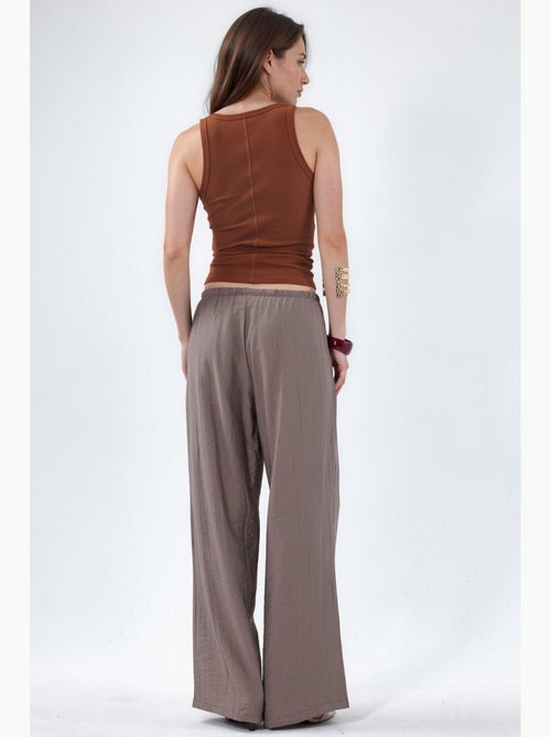 Pantaloni in tessuto a gamba larga da donna busem - Kiabi Pantaloni in tessuto a gamba larga da donna busem - Kiabi
