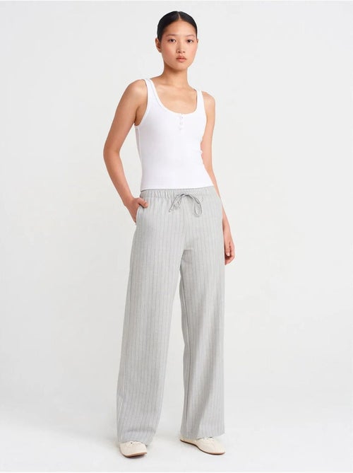 Pantaloni in tessuto a righe a gamba ampia dilvin - Kiabi