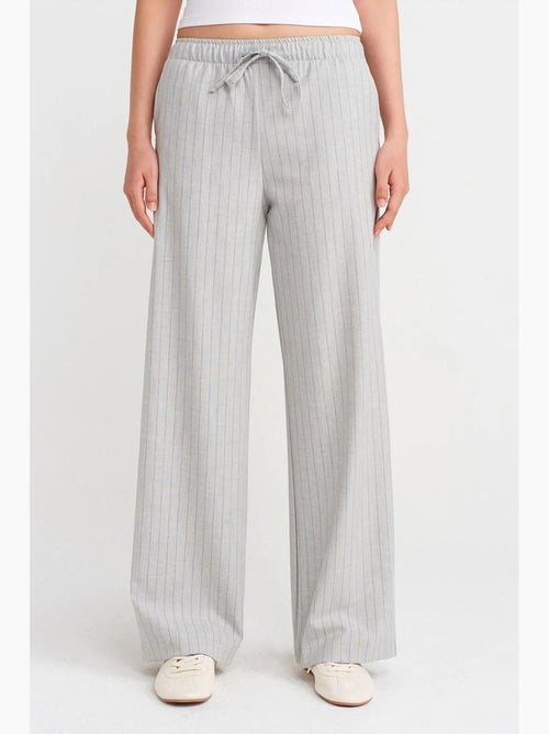 Pantaloni in tessuto a righe a gamba ampia dilvin - Kiabi