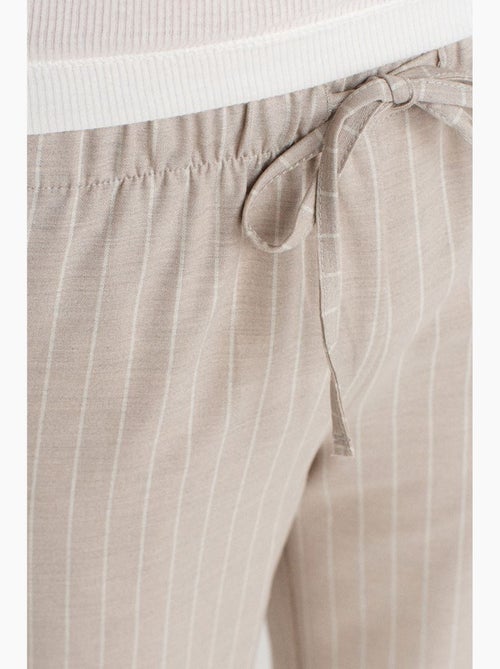 Pantaloni in tessuto a righe a gamba ampia dilvin - Kiabi Pantaloni in tessuto a righe a gamba ampia dilvin - Kiabi