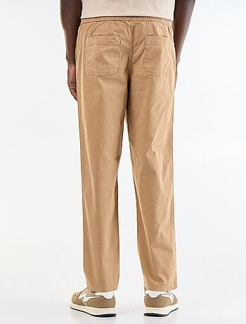 Pantaloni in tessuto effetto pelle di pesca