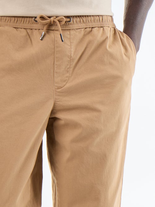 Pantaloni in tessuto effetto pelle di pesca - Kiabi Pantaloni in tessuto effetto pelle di pesca - Kiabi