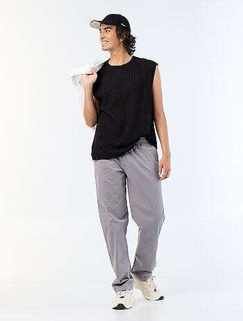 Pantaloni in tessuto effetto pelle di pesca