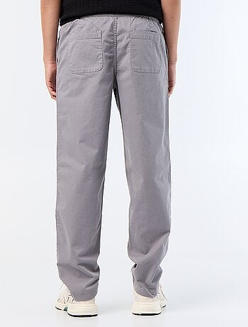 Pantaloni in tessuto effetto pelle di pesca