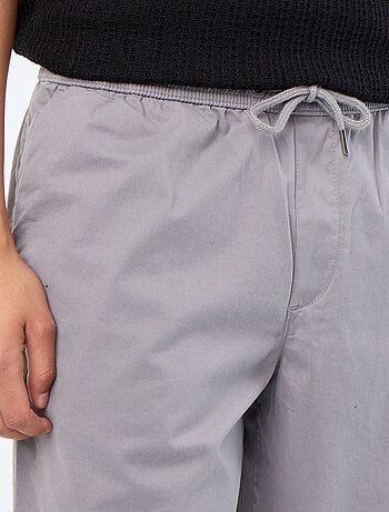 Pantaloni in tessuto effetto pelle di pesca