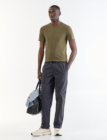 Pantaloni in tessuto effetto pelle di pesca