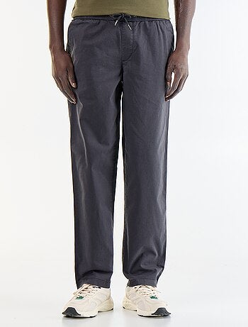 Pantaloni in tessuto effetto pelle di pesca