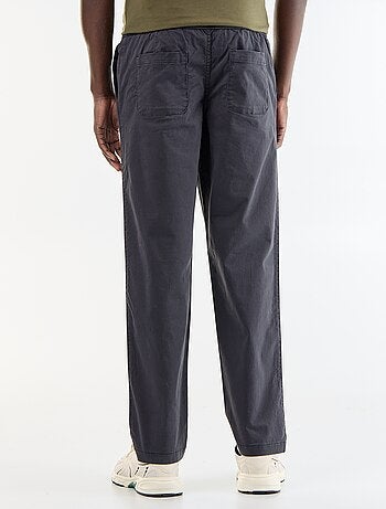 Pantaloni in tessuto effetto pelle di pesca
