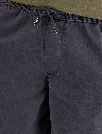 Pantaloni in tessuto effetto pelle di pesca