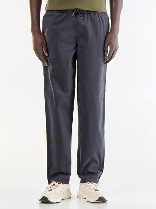 Pantaloni in tessuto effetto pelle di pesca - Kiabi Pantaloni in tessuto effetto pelle di pesca - Kiabi