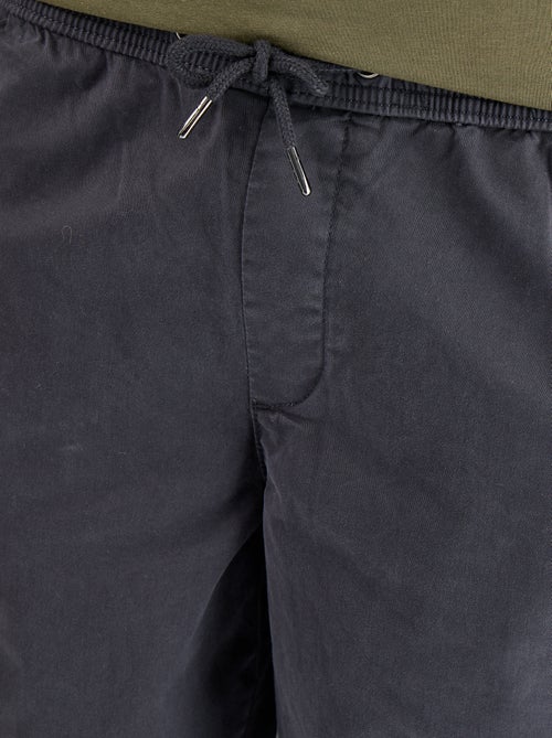 Pantaloni in tessuto effetto pelle di pesca - Kiabi Pantaloni in tessuto effetto pelle di pesca - Kiabi