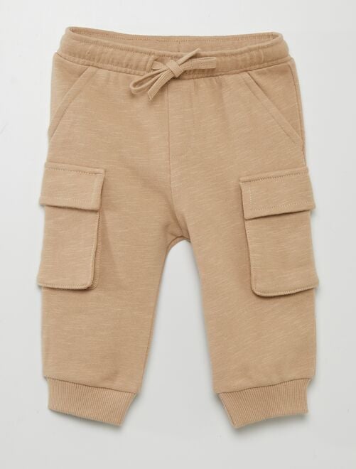 Pantaloni in tessuto felpato con tasche laterali - Kiabi