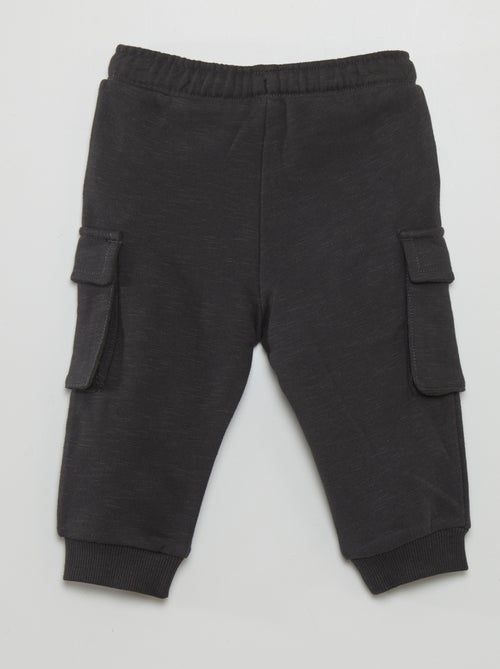 Pantaloni in tessuto felpato con tasche laterali - Kiabi