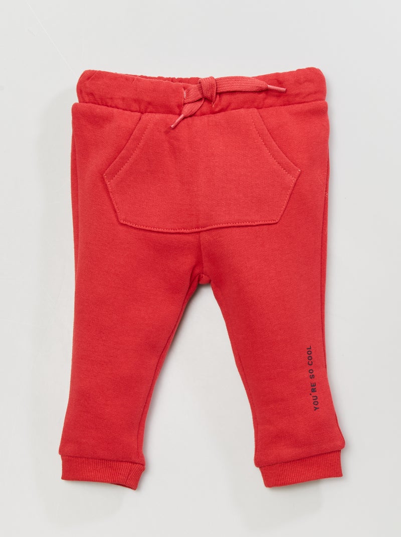 Pantaloni in tessuto felpato fantasia ROSSO - Kiabi
