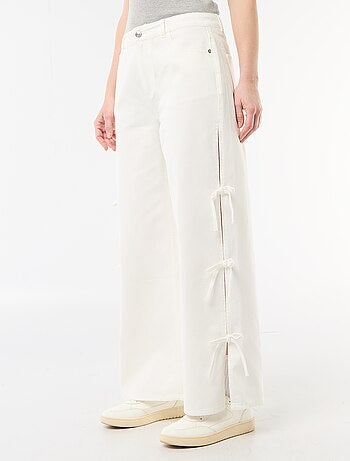 Pantaloni in twill con nodi sui lati