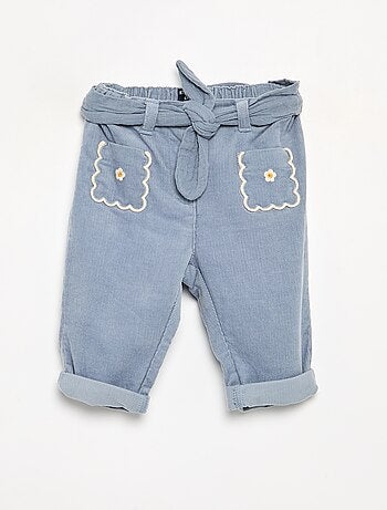 Pantaloni in velluto a coste con tasche ricamate