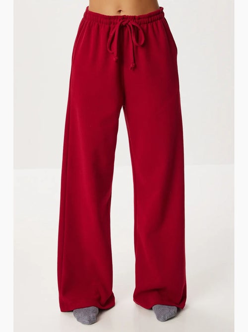 Pantaloni jogger a gamba larga con chiusura a coulisse istanbul - Kiabi Pantaloni jogger a gamba larga con chiusura a coulisse istanbul - Kiabi