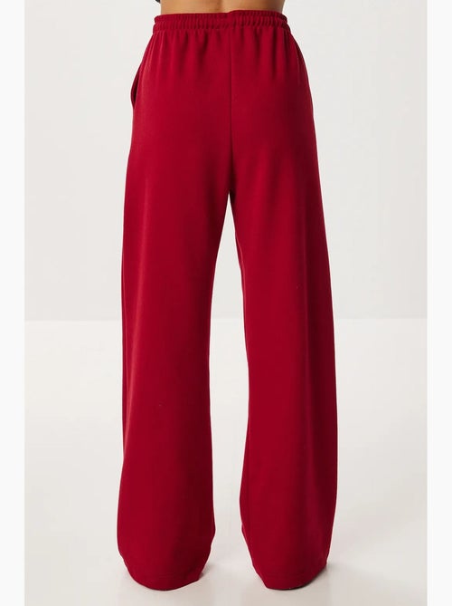 Pantaloni jogger a gamba larga con chiusura a coulisse istanbul - Kiabi Pantaloni jogger a gamba larga con chiusura a coulisse istanbul - Kiabi
