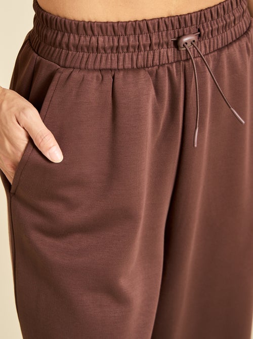 Pantaloni jogger a tinta unita a vita regolare - Kiabi Pantaloni jogger a tinta unita a vita regolare - Kiabi