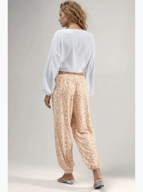 Pantaloni jogger a vita bassa con stampa zebrata hiccup - Kiabi Pantaloni jogger a vita bassa con stampa zebrata hiccup - Kiabi
