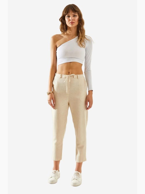 Pantaloni jogger alla caviglia con coulisse lucci - Kiabi Pantaloni jogger alla caviglia con coulisse lucci - Kiabi