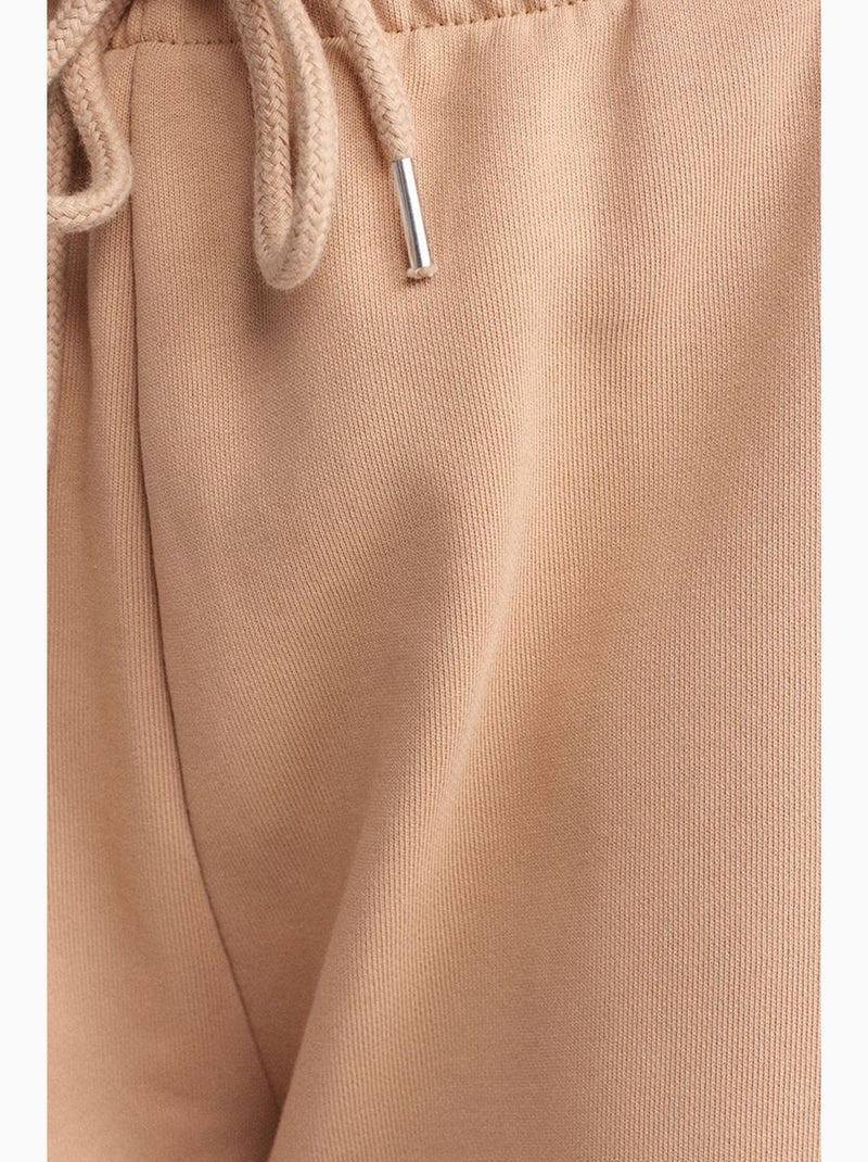 Pantaloni jogger ampi in felpa dilvin Beige naturale - Kiabi