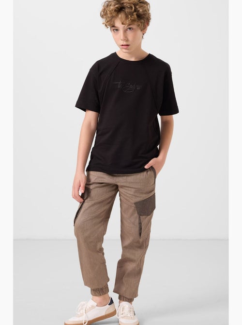 Pantaloni jogger cargo bambino tommy - Kiabi Pantaloni jogger cargo bambino tommy - Kiabi